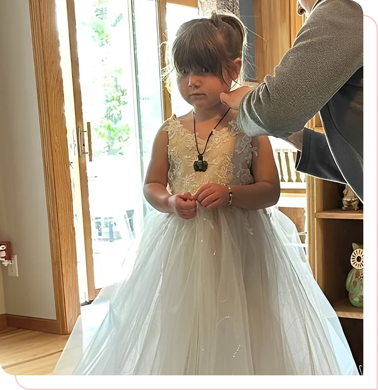 Baby girl in a wedding dress